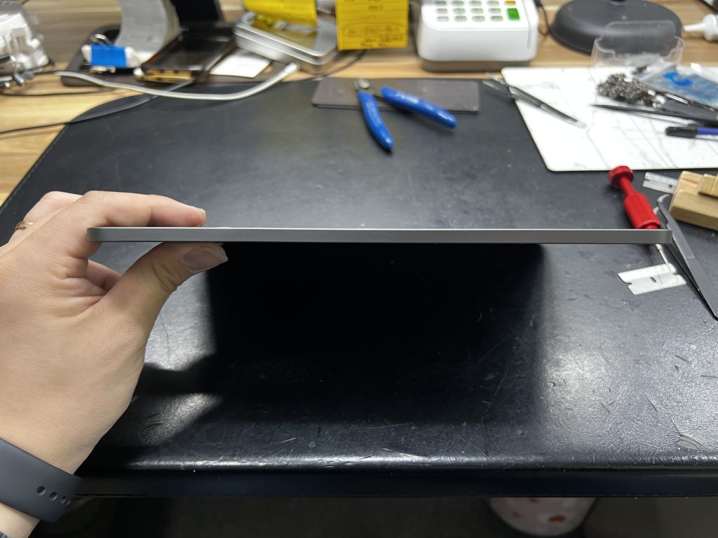 The bent iPad Air 4 has been repaired at FixStory in downtown LA.