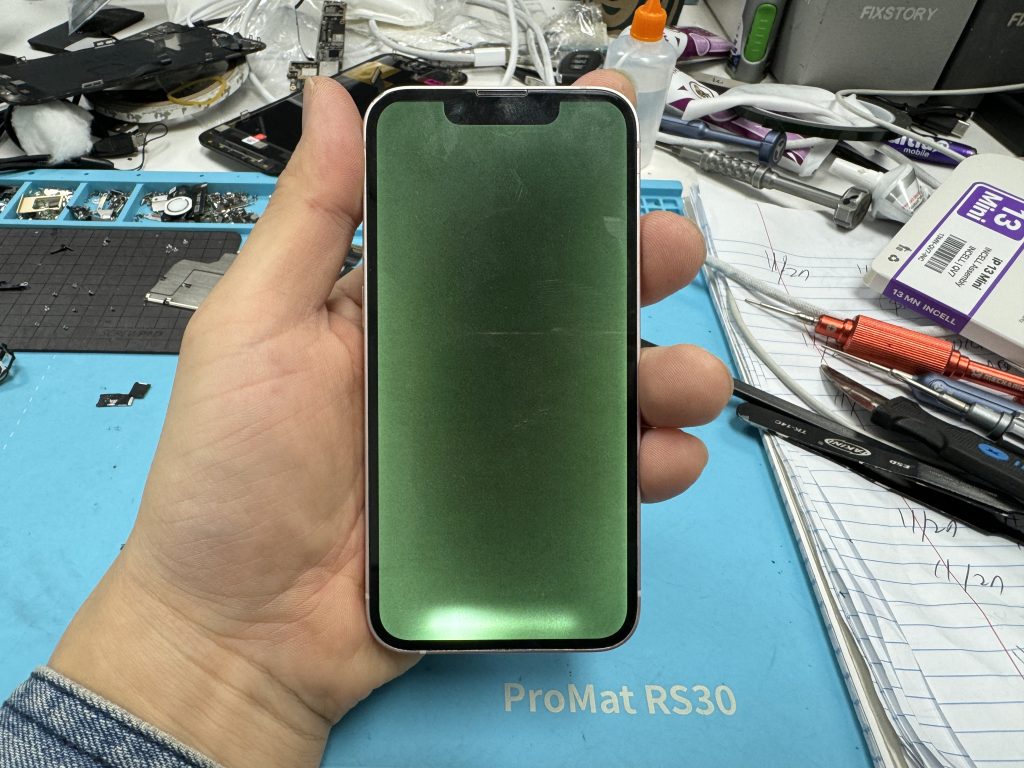 broken iphone screen, color is changed to green